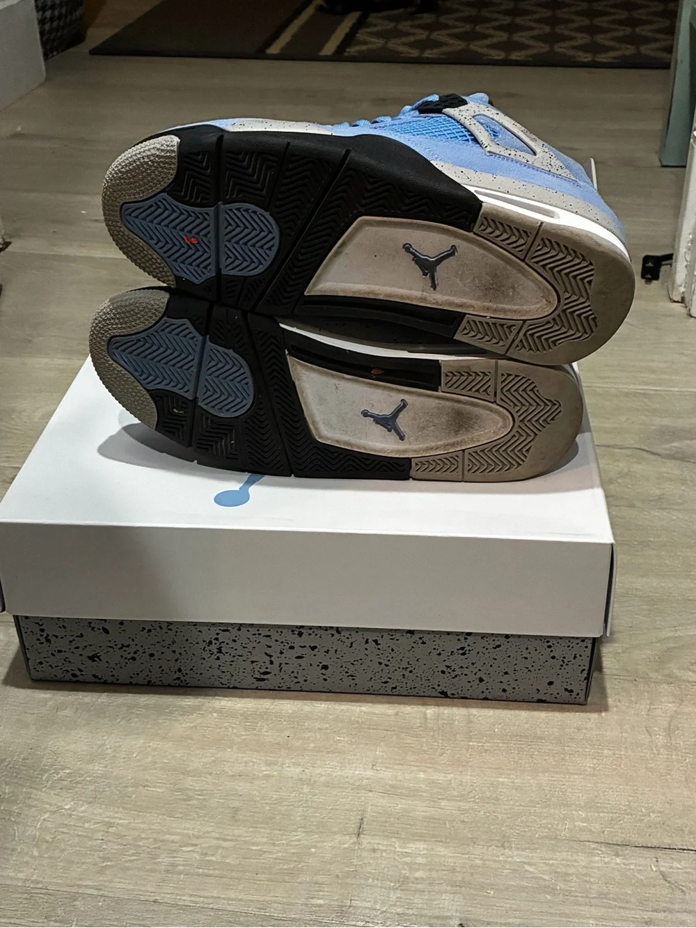 Air Jordan 4 UNC Men’s Athletic Shoes - Light Blue and Black